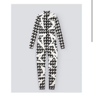 PERFECT MOMENT WOMEN’S STAR ONESIE